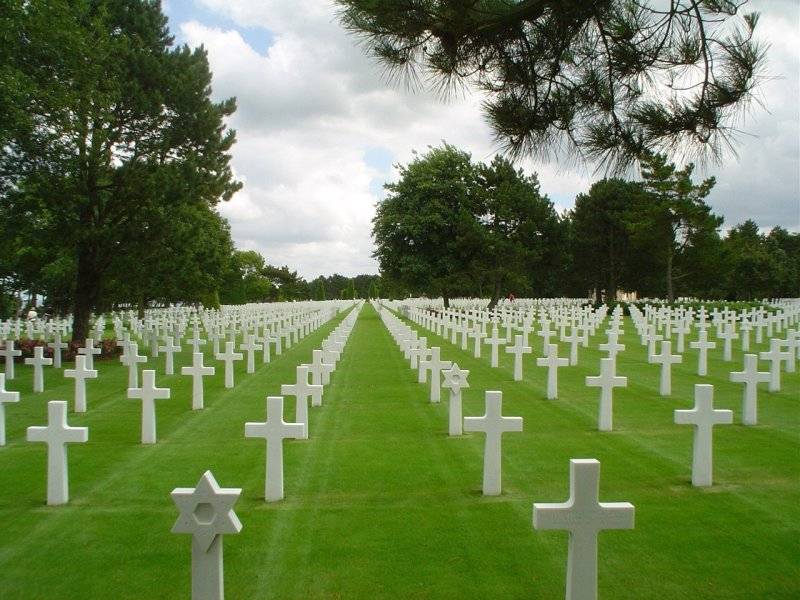 00000aa The American Cemetery and Memorial in Normandy covers 172.5 acres and contains 9,388 b...jpg