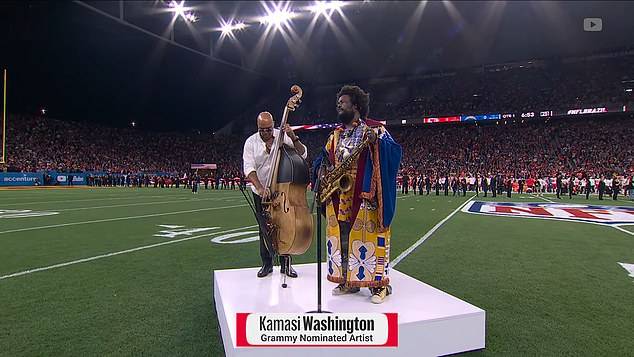 Jazz saxophonist Kamasi Washington performed The Star-Spangled Banner before the game