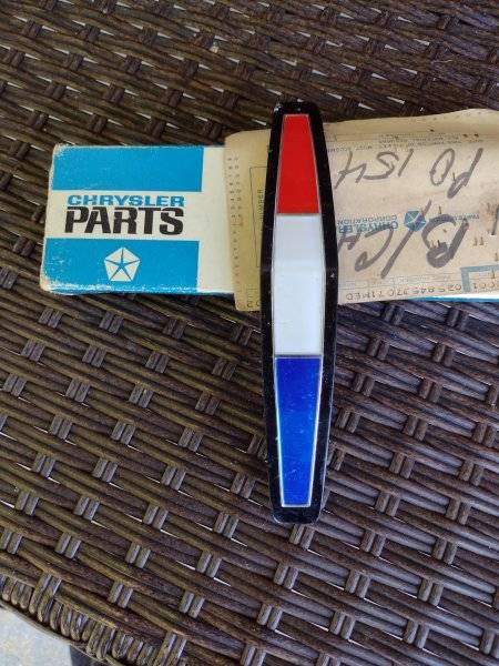 1965 Sport Fury Grill Emblem NOS.jpg