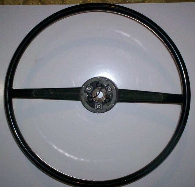 1966 Coronet 500 - 2 spoke black plastic steering wheel - front view.jpg