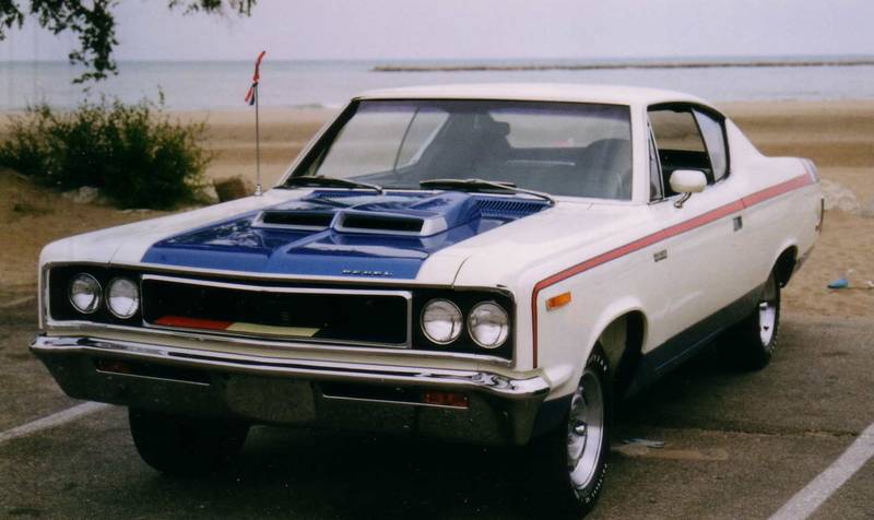 1970_AMC_The_Machine_2-door_muscle_car_in_RWB_trim_by_lake.jpg