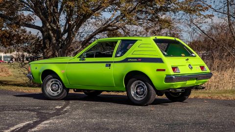 1972-AMC-Gremlin-X-green-with-black-stripe-side-quarter-Mecum-.jpg