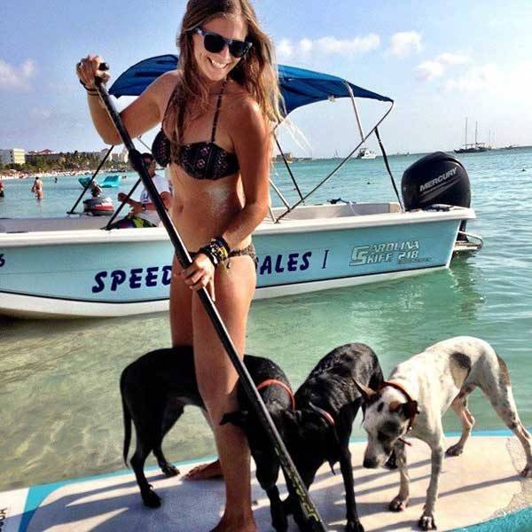 3-dogs-and-a-girl-in-a-bikini-on-a-sup-600x600.jpg