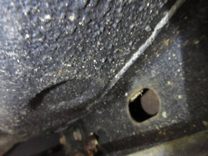 38_fuel_line_EGR_line_hole.JPG