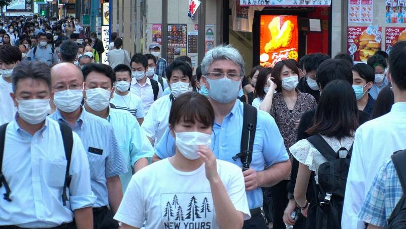 Image for article: Asians Still Sticking With The Masks