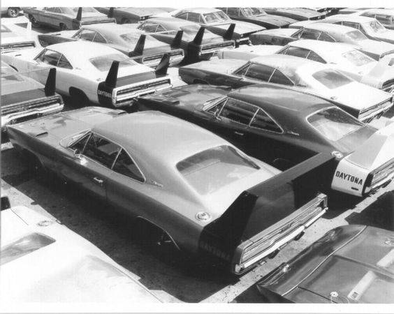 69 Daytona Charger Advert. #1 storage lot.jpg