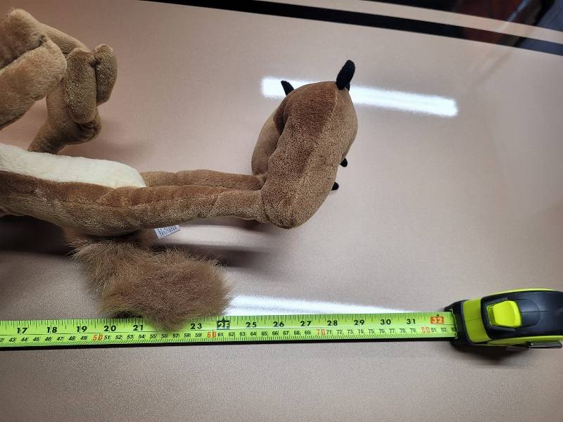 May be an image of deer, measuring stick and text