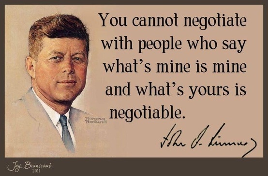 American JFK negotiate.jpg