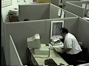 Angry office worker smashes computer.gif