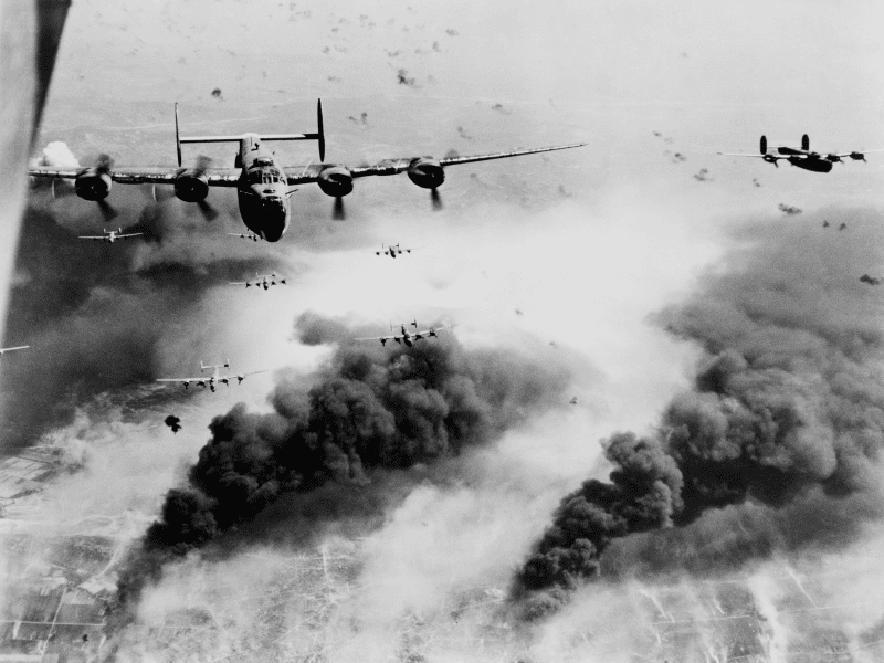 B-24 Liberators of the 15th U.S. Army Air Forces during a bombing run over the Concordia Vega ...png