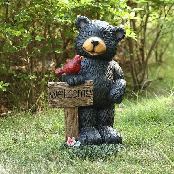 BEAR+HOLDING+WELCOME+SIGN.jpg