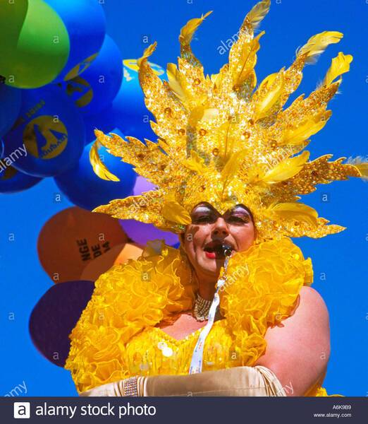 bright-yellow-costume-dressed-up-for-gay-pride-parade-2004-brighton-A6K9B9.jpg