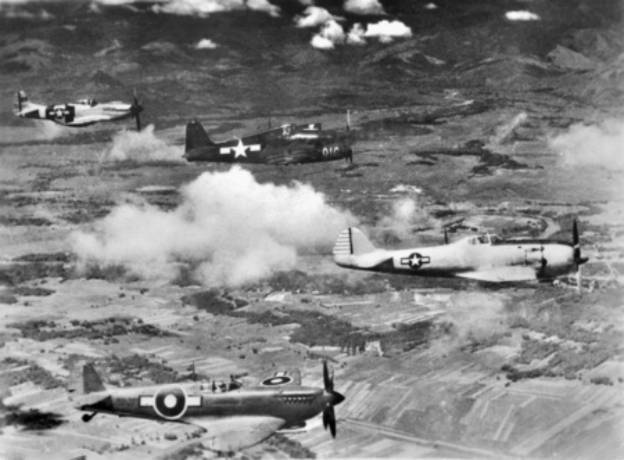 Captured_Ki-84_with_Seafire_Hellcat_and_Mustang_1945.jpg