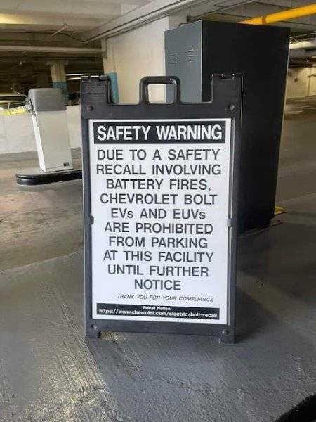 D) EV - warning sign due to safety battery fires GM Bolt-Volt EV & EUVs no parking.jpeg