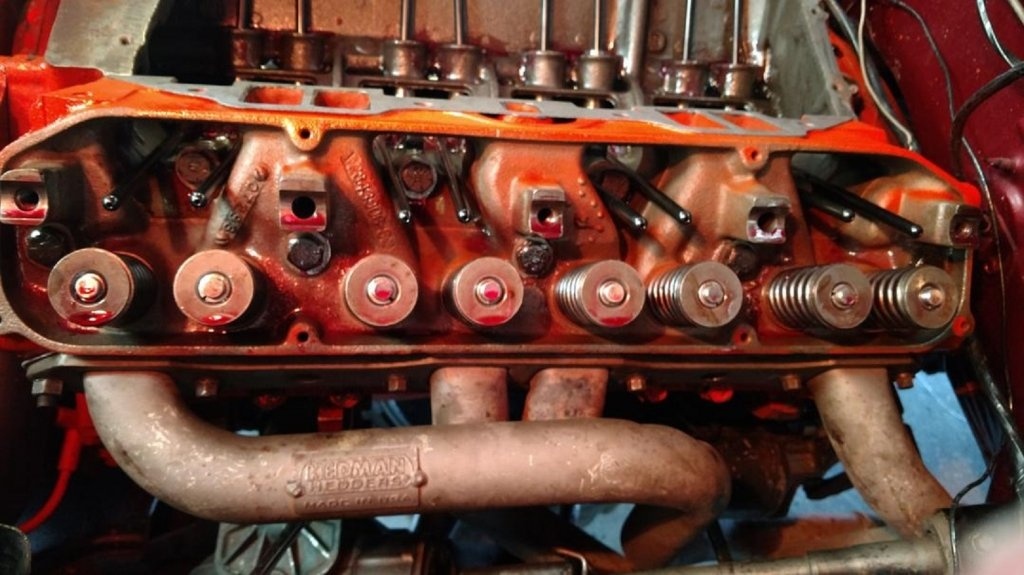 drivers side torqued header installed.jpg