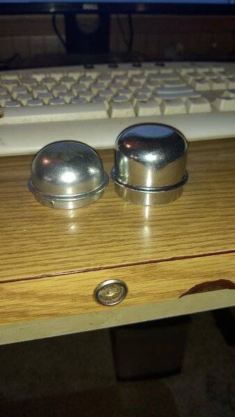 dust caps chinese vs nos.jpg
