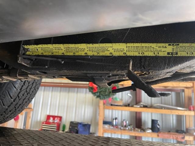 emergency brake cable rod measurement to frame bracket.jpg