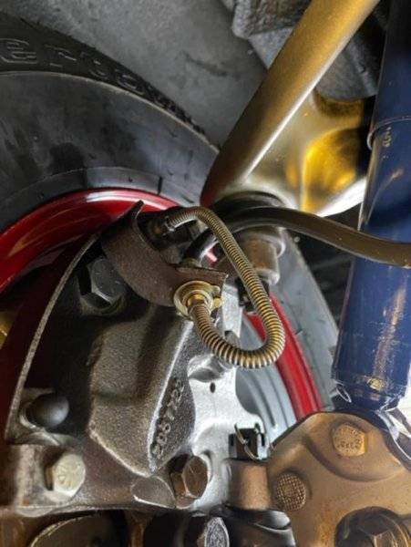 front left brake caliper line.jpg