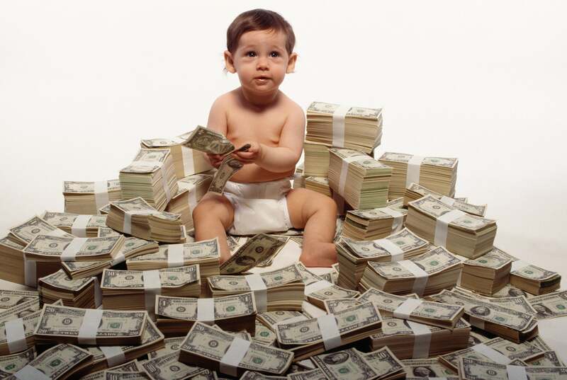 getty-rich-kid-baby-on-money.jpg