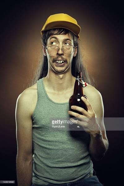 goofy-redneck-with-moonshine-picture-id143919532.jpg