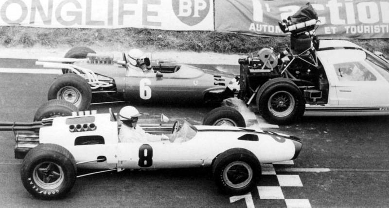 GT40+hauling+camera+to+film+Gran+Prix.jpg