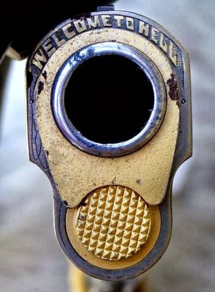 Gun Colt 1911 .45acp looking down the barrel - welcome to hell.jpg