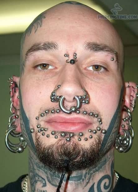 Guy-With-Multiple-Extreme-Face-Piercings.jpg