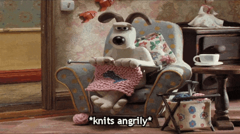 Knitting dog.gif