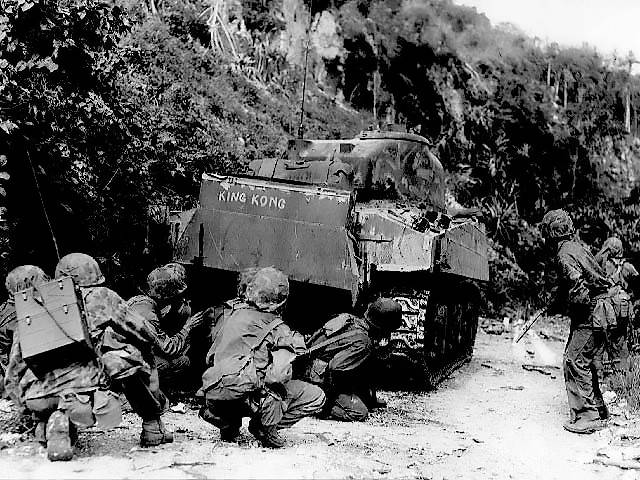 Marines_take_cover_behind_medium_tank.jpg
