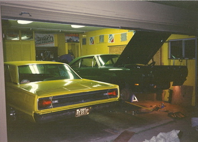 my Coronet and Matt's 69 Road Runner under construction in my garage in 1991.jpg