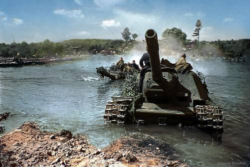 nks+of+Soviet+troops+advance+west+along+the+forest+roads+of+Latvia_+forcing+water+barriers_+1944.jpg