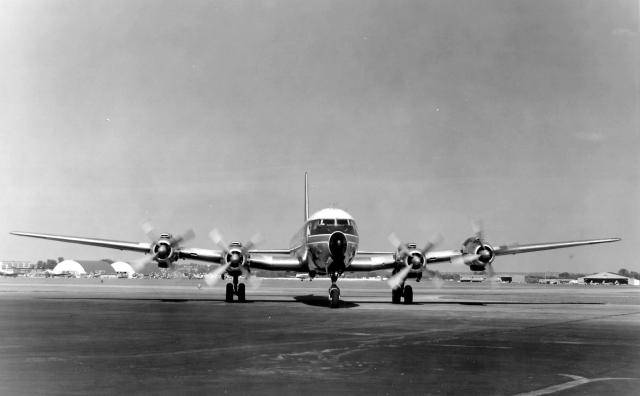 NWA_DC7_N285_MSP-taxi1_unk_LoganCoombs_BordenColl.jpg