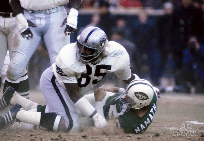 Oakland Raiders DE #85 Carlton Oats sacking Joe Namath 1969.jpg