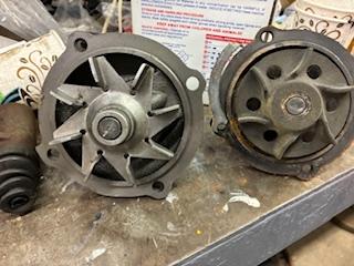 Orignal A-C water pump vs aftermarket.jpg