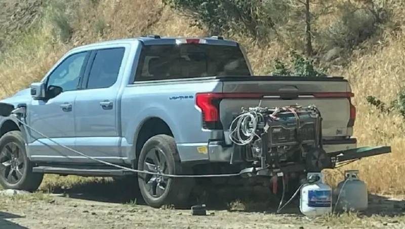 A Ford Lightning charging off a portable propane generator.