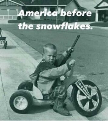 Smiley America before Snowflakes -kid on a big wheel with a toy gun.jpg