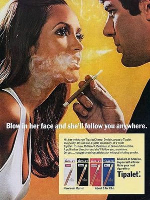 Smiley Blowing it in her face advert..jpg