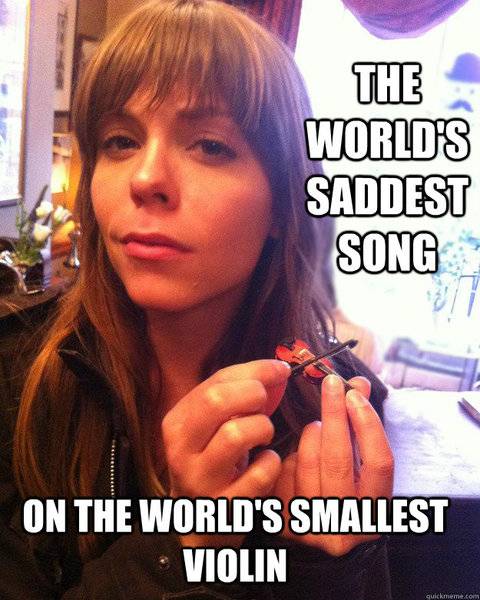 Smiley Worlds smallest violin playing worlds saddest song.jpg
