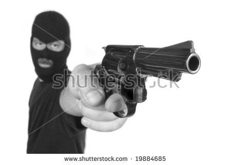 stock-photo-a-robber-with-hidden-face-points-his-gun-in-a-robbery-attempt-19884685.jpg