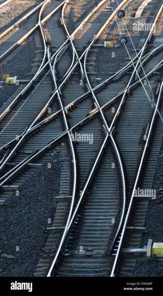 switches-of-a-railway-yard-offer-visual-symbolism-for-choices-made-E9NXRF.jpg