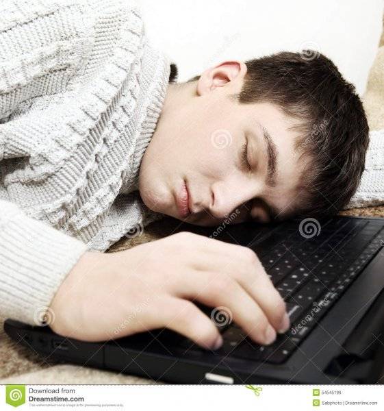 teenager-sleep-laptop-tired-sofa-54545196.jpg