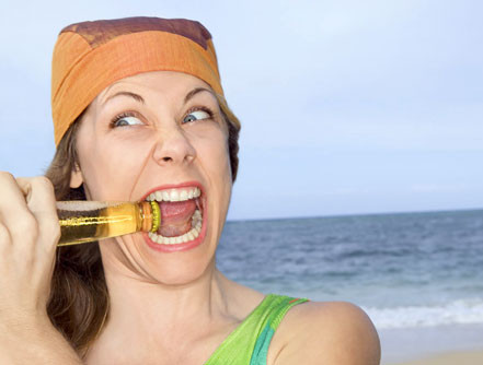 That-Ruin-Your-Oral-Health_woman_biting_bottle_cap.jpg
