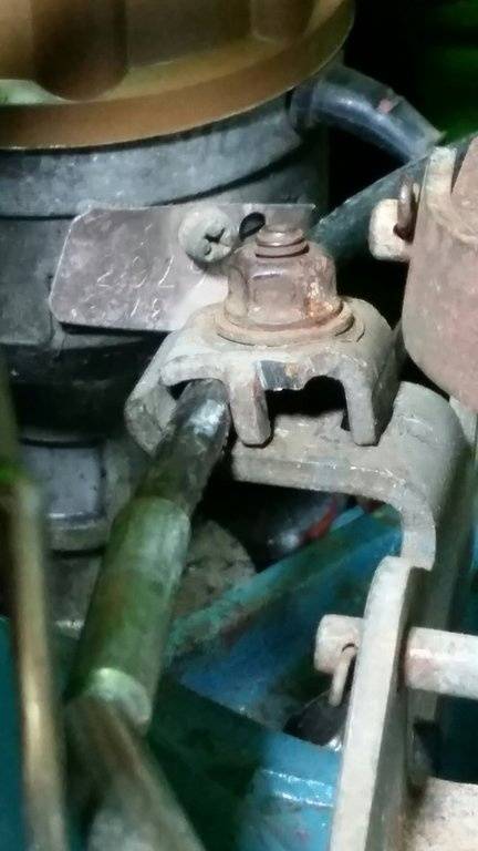 Throttle bracket hold down -1.jpg