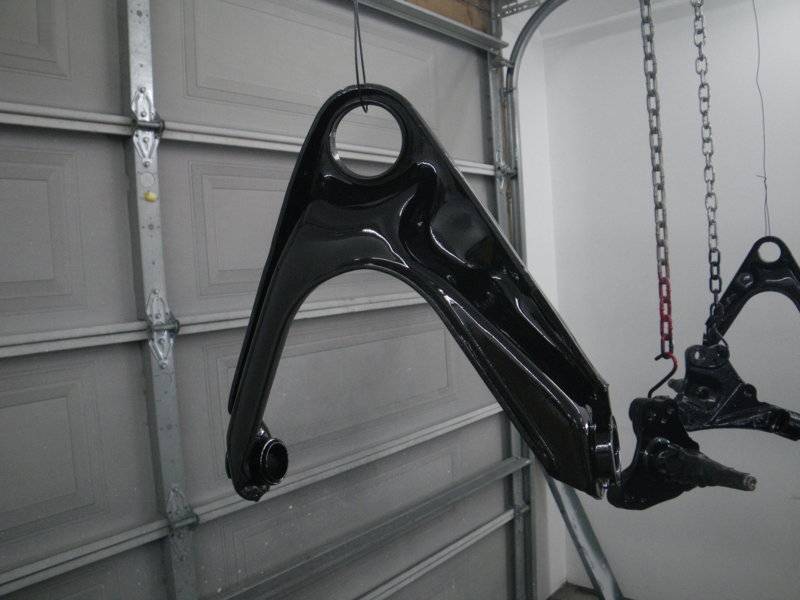 Upper Control Arms in Epoxy.JPG