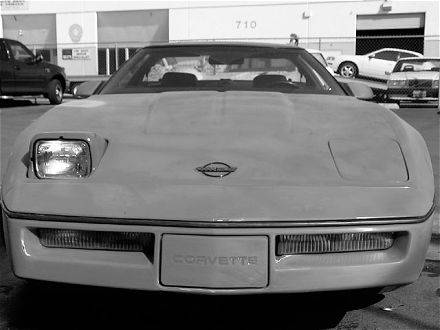vemp_0407_01_z+c4_chevy_corvette+open_headlights.jpg