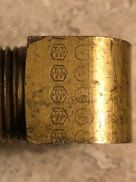 Weatherhead logo on vintage brass fitting mopar nascar 8.75 gear center section.JPG