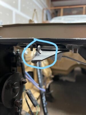 spring hole on Hood latch.jpg