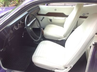 1971-plymouth-road-runner-440-6-pack-4-speed-plum-crazy-white-interior-show-race-7.jpg