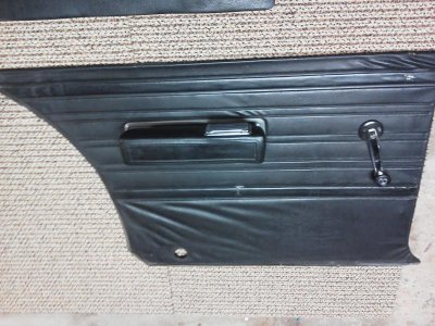drivers side rear door panel arem rest and crank.jpg drivers side rear door panel arem rest and crank.jpg
