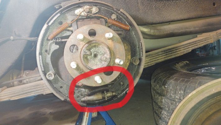 existing rear brakes left side.jpg